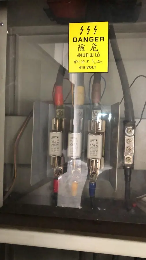Electrical fuse cabinet checked by an electrician in Singapore