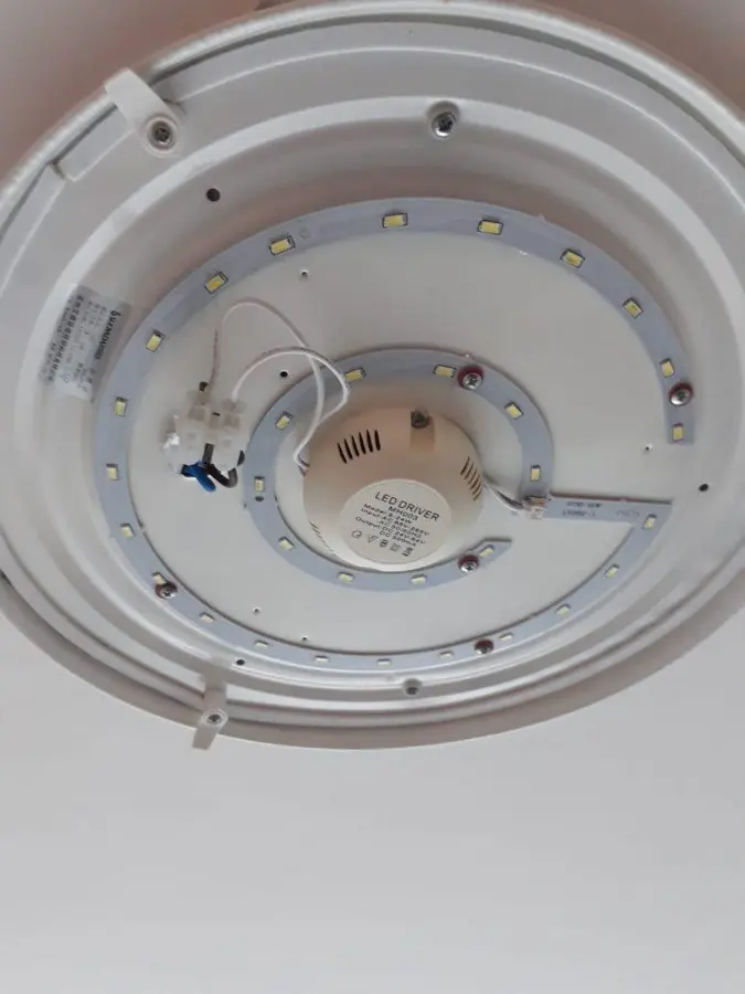 LED ceiling light installation in a Singapore home